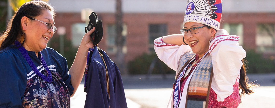Native American graduate with mother