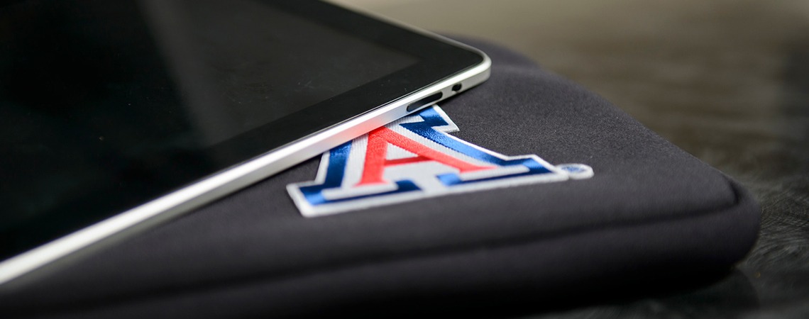 Tablet laying on a University of Arizona case